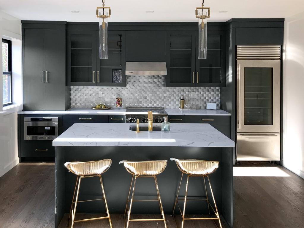 Artisanal kitchen cabinetry with handcrafted dovetail drawers and seamless integrated appliances
