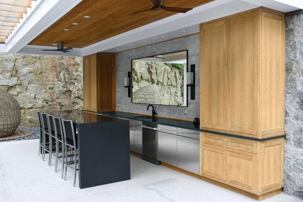 Custom architectural millwork, curved reception desk or custom oak dining banquet with continuous radius joinery